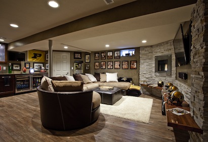 New finishes transformed one end of the basement into a bright, inviting media c