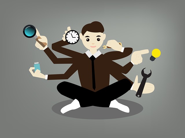 Seated man with with 6 arms each juggling a different task