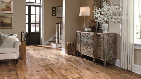 The Antigua Collection from Mannington Mills, utilizes 3-, 5-, and 7-inch random width boards and a hand scraping technique to evoke a rustic look.