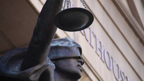 scales of justice outside the courthouse