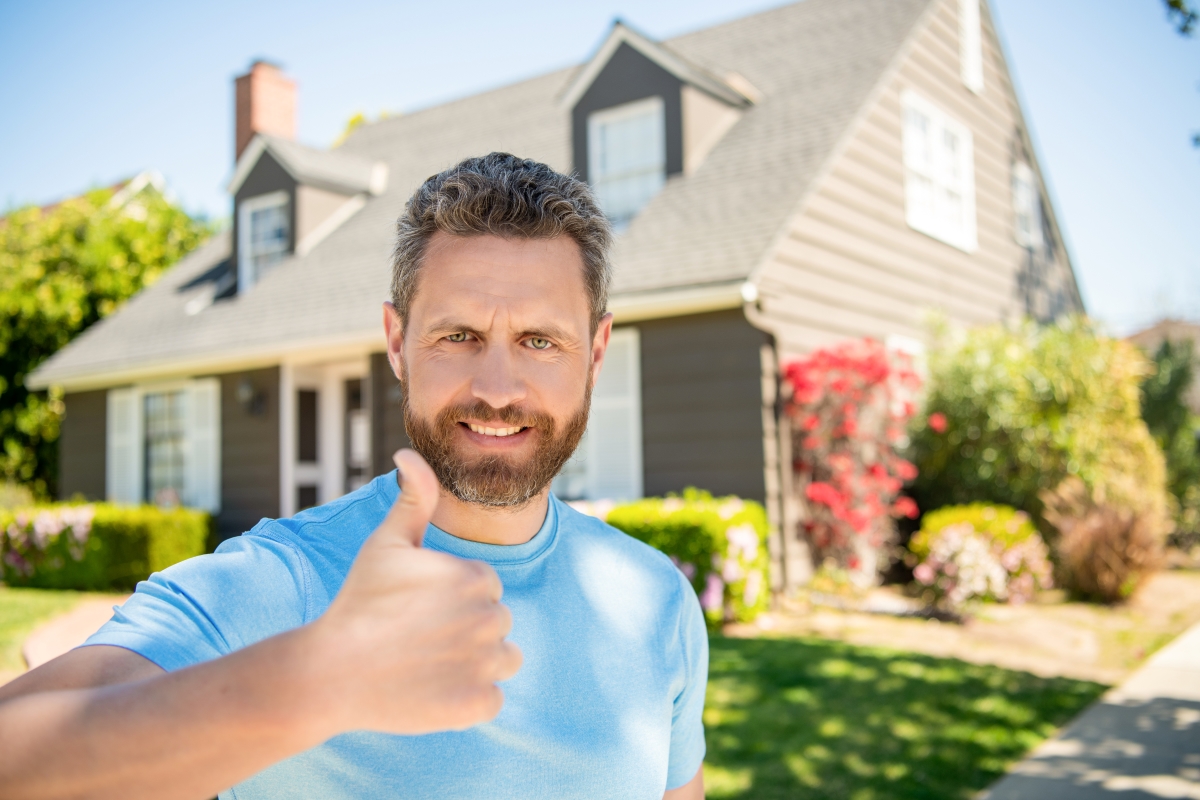 Satisfied home improvement customer giving thumbs up