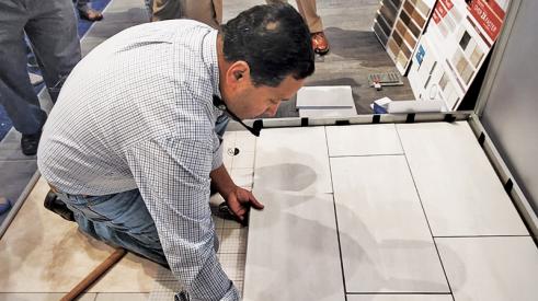 A floating floor system that installs twice as fast as traditional tile