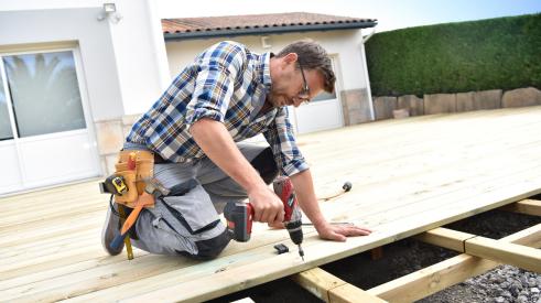 Carpenter installs deck