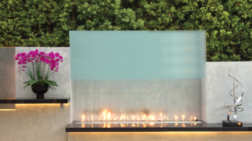 Fireplaces have long been a staple of outdoor room design, but more manufacturers are now making gas fireplaces for exterior use, dramatically altering the look of the space from rustic or transitional to a modern aesthetic. 
