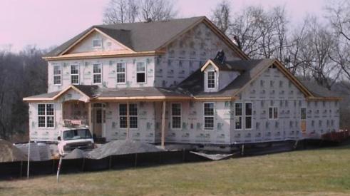 Housing starts drop but building permits on the rise