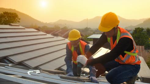 Workers on a roof installation