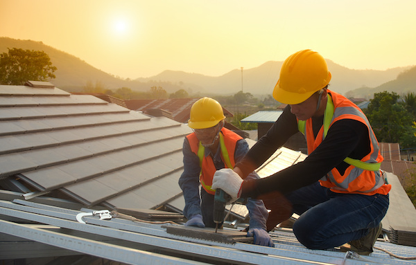 Workers on a roof installation